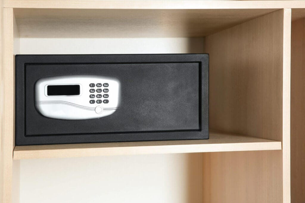 A safe placed in a wooden closet