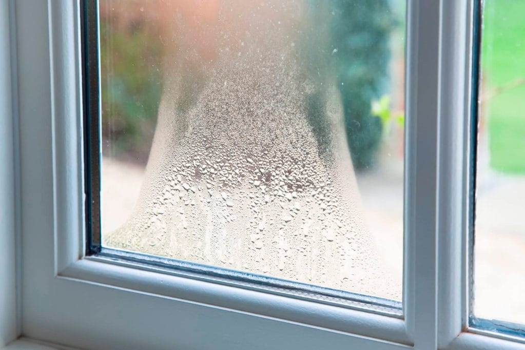 Close up of condensation within a double pane window