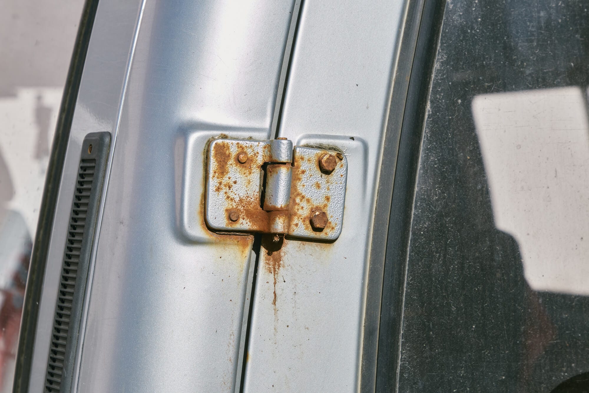 Rusty car door hinges