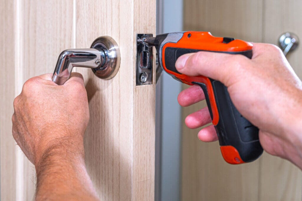 Tightening handle screws with an electric screwdriver